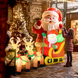 Gonflable de Noël Père Noël traîneau et rennes 240 cm