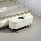 Banc coffre capitonné à cannelures, pieds dorés
