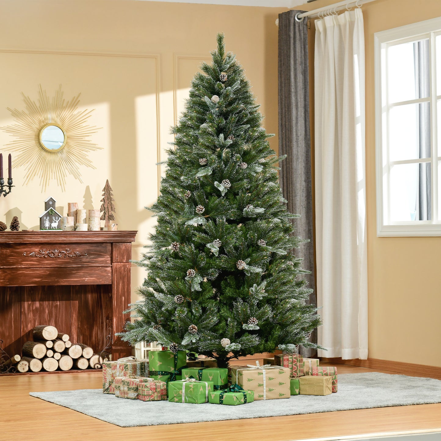 Sapin de Noël artificiel enneigé avec pommes de pin
