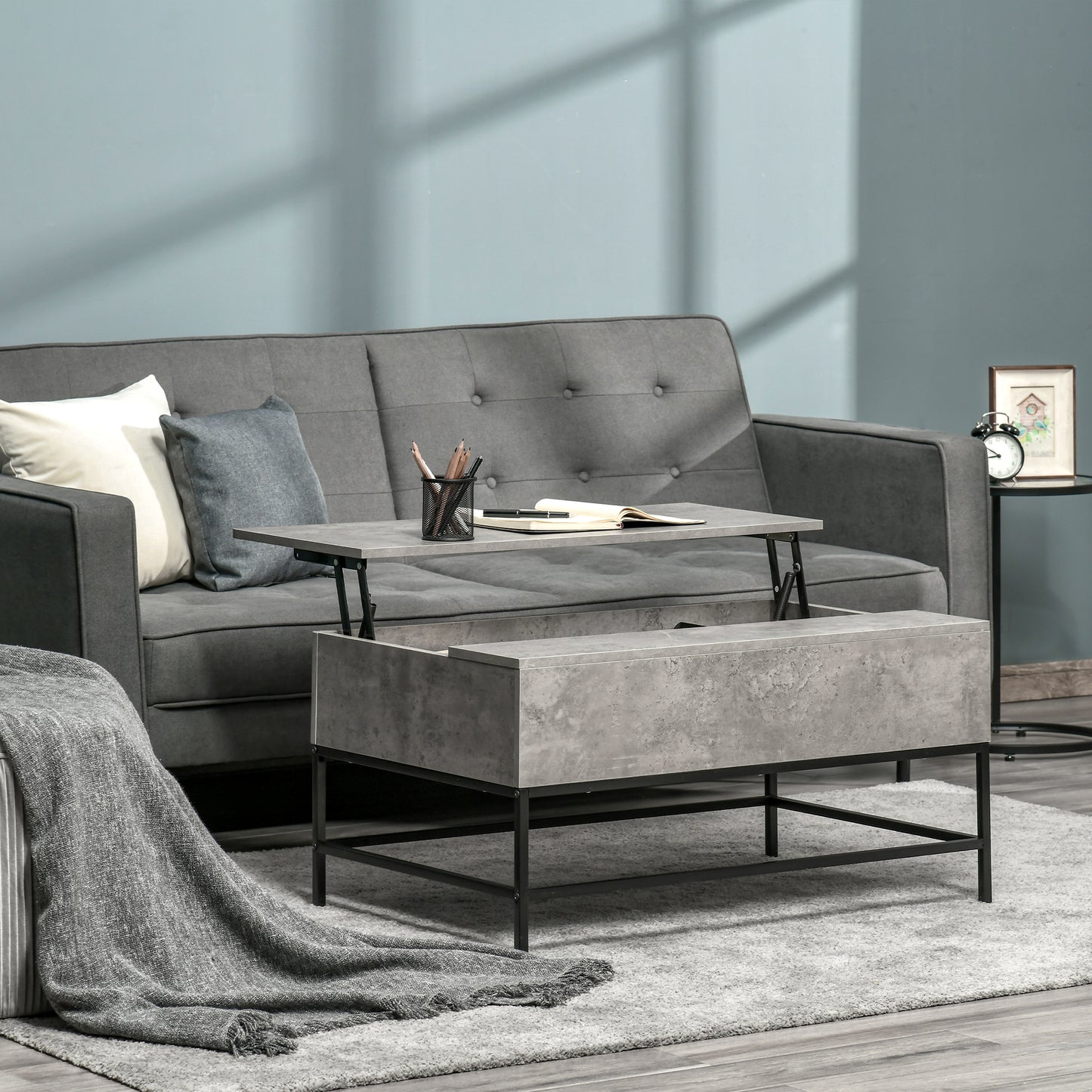 Table basse plateau relevable avec rangement caché