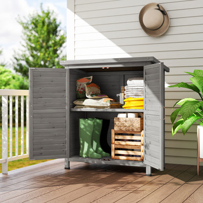 Remise de jardin en bois avec 2 portes et tablettes