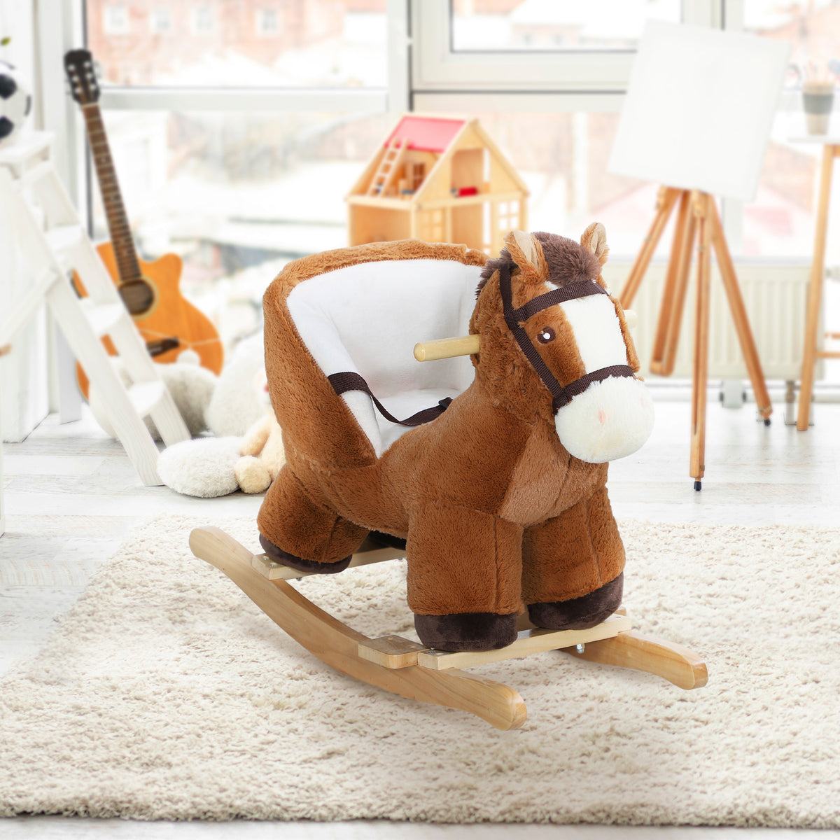 Cheval à bascule pour bébé en peluche avec son