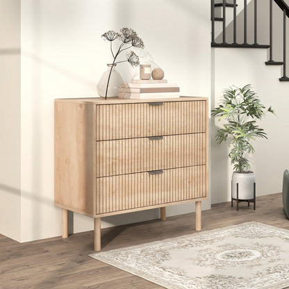Commode 3 tiroirs à panneaux cannelés et pieds en bois