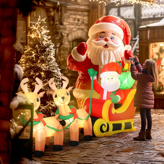Gonflable de Noël Père Noël traîneau et rennes 240 cm