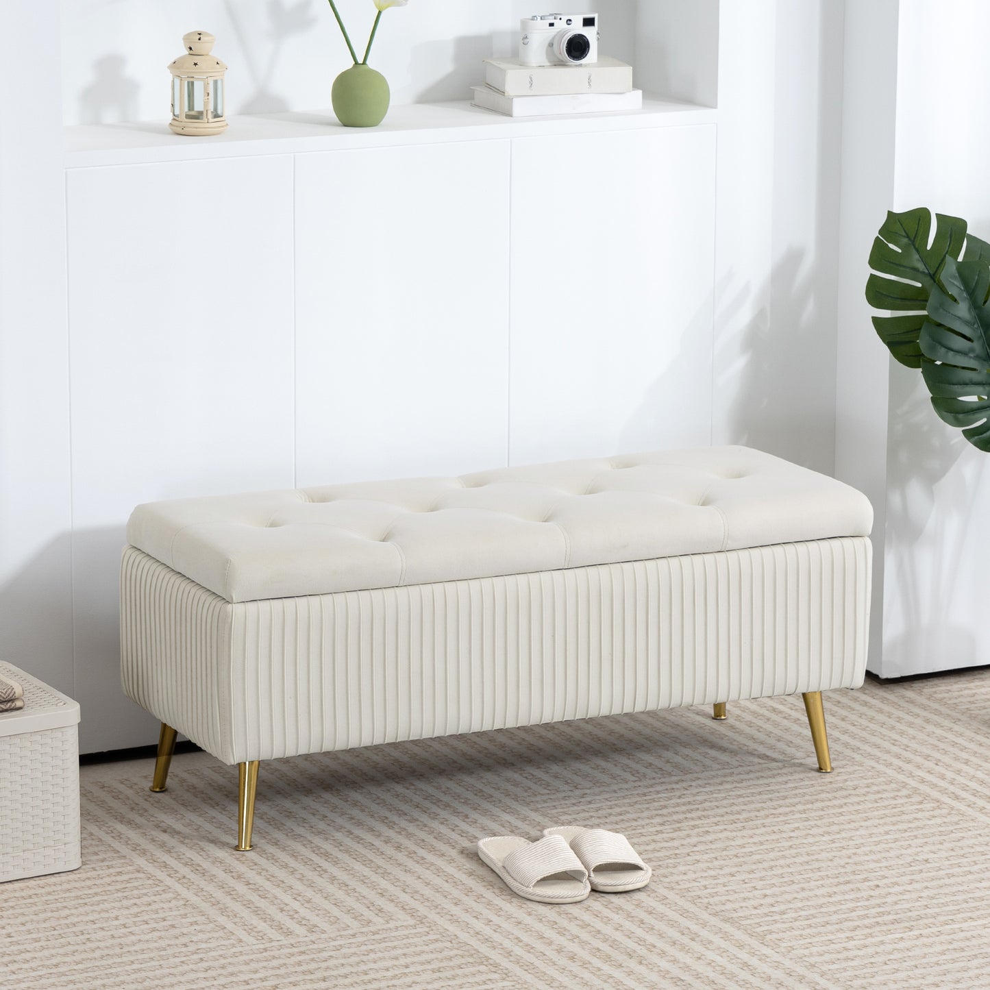Banc coffre rembourré avec pieds dorés 109 cm