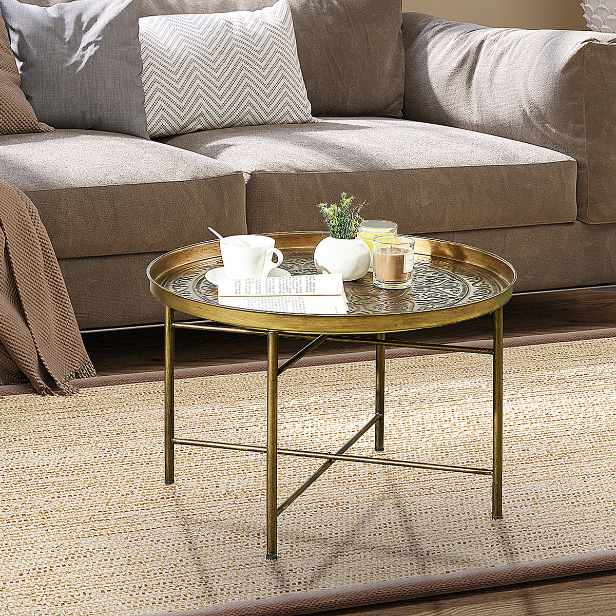 Table basse ronde plateau martelé cadre métal