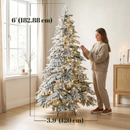 Arbre de Noël artificiel illuminé et enneigé